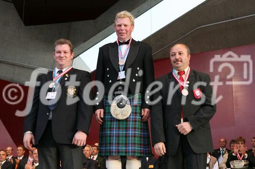 (C) fotodienst/Anna Rauchenberger - Grafenegg, 16.08.2008 - Siegerehrung der Pflüger WM in Grafenegg. Thomas Cochrane (Nordirland), Andrew B. Mitchell (Schottland) und Yves Thievon (Frankreich).