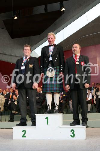 (C) fotodienst/Anna Rauchenberger - Grafenegg, 16.08.2008 - Siegerehrung der Pflüger WM in Grafenegg. Thomas Cochrane (Nordirland), Andrew B. Mitchell (Schottland) und Yves Thievon (Frankreich).