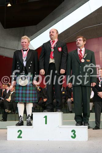 (C) fotodienst/Anna Rauchenberger - Grafenegg, 16.08.2008 - Siegerehrung der Pflüger WM in Grafenegg. Andrew B. Mitchell (Schottland), Yves Thievon (Frankreich) und Thomas Cochrane (Nordirland). 