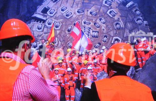Dem abtretenden Bundesrat und UVEK-Vorsteher Moritz Leuenberger kommen fast die Tränen beim Durchstich im Weltrekordhalter Gotthard Tunnel. Touched and close to get wet eyes: Swiss Chancellor Moritz Leuenberger live from the Gotthard break through