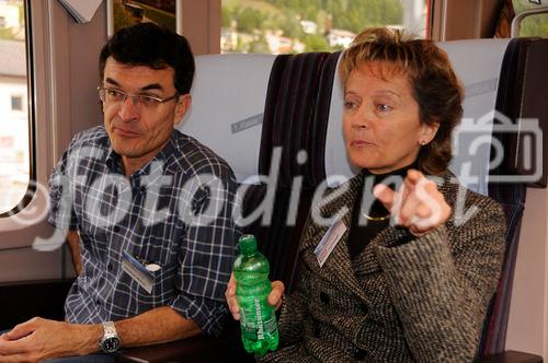 Bundesrätin und Justizministerin Eveline Widmer-Schlumpf im RhB-Zug. Swiss Chancellor and Minister of Justice Eveline Widmer-Schlumpf in the train with her husband