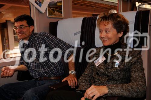 Bundesrätin und Justizministerin Eveline Widmer-Schlumpf mit ihrem Ehemann im RhB-Zug auf der Fahrt zur 100 Jahre Bernina-Bahn Feier. Swiss Chancellor and Minister of Justice Eveline Widmer-Schlumpf with her husband in the train