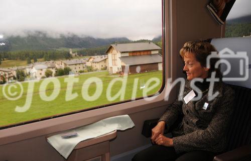 Bundesrätin und Justizministerin Eveline Widmer-Schlumpf im RhB-Zug auf der Fahrt zur 100 Jahre Bernina-Bahn Feier. Swiss Chancellor and Minister of Justice Eveline Widmer-Schlumpf in the train