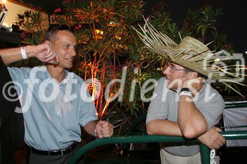 (C) fotodienst/Anna Rauchenberger - Wien 29.06.2006 - COMNET - Sommerfest 'Cuba Libre'. FOTO: Andreas Bergler (COMNET Geschäftsführer, CEO, rechts) mit VIP-Gast.
