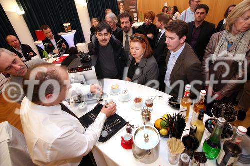 (C) fotodienst/Anna Rauchenberger - Wien, 19.3.2009 - Jura Österreich lud zu außerordentlichen Sternstunden des Kaffees in die 'Laterne' der Wiener URANIA ein und präsentierte die neue Signatur-Line des Unternehmens, Kaffee-Vollautomaten, die Technik, Design, Genuss und Luxus vereinen. FOTO: Daniel Heininger, Profi-Kaffee-Sommelier, zeigt professionelle  Zubereitung von Kaffee