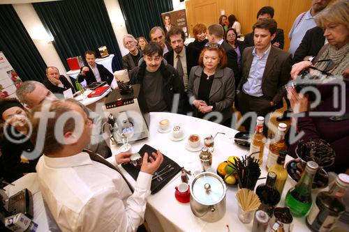 (C) fotodienst/Anna Rauchenberger - Wien, 19.3.2009 - Jura Österreich lud zu außerordentlichen Sternstunden des Kaffees in die 'Laterne' der Wiener URANIA ein und präsentierte die neue Signatur-Line des Unternehmens, Kaffee-Vollautomaten, die Technik, Design, Genuss und Luxus vereinen. FOTO: Daniel Heininger, Profi-Kaffee-Sommelier, zeigt professionelle  Zubereitung von Kaffee