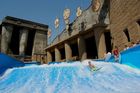 Young boy surfing in the water channel, basin of the luxury five star hotel RIXOS in Belek, Antalya, Turkey. Fun, water-sport, holiday, Junger Knabe surft im Wasserkanal des Luxus-Hotels RIXOS an der türkischen Riviera in Belek bei Antalya.