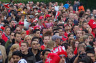 Fussballfans in der Public viewing arena in Zürich beim EM08-Eröffnungsspiel. football-fans in the public viewing zone of Zürich watching the Inauguration-game