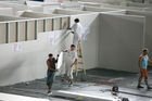 (C) fotodienst/Anna Rauchenberger - Wien, 03.07.2008 -  RIGIPS: Abbau des Fancamp. FOTO: Arbeiter bauen in rasantem Tempo die einst ebenso schnell erbaute Unterkuft für Fußballfans ab. 