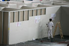 (C) fotodienst/Anna Rauchenberger - Wien, 03.07.2008 -  RIGIPS: Abbau des Fancamp. FOTO: Arbeiter bauen in rasantem Tempo die einst ebenso schnell erbaute Unterkuft für Fußballfans ab. 