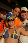 Having fun: Swedish footballfan girl with dutch footballfans in Basel. Eine schwedische Fussballbraut und holländische Fans amüsieren sich köstlich in der Fanzone von Basel 