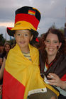 Junger stolzer Knabe mit seiner Mutter am Spiel Deutschland-Türkei. Young german footballfan-boy with his mother watching the football-match Germany-Turkey