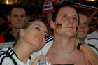 Deutsches Fussballfan-Paar in der Fan-Arena von Zürich. German football couple in Zürichs Fanarena  are enjoying the match Germany-Turkey