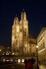 Zürich, Grossmünsterkirche an der Limmat nachts hell beleuchtet, Switzerland, Zürich by night. Grossminster-church at the Limmat river in the old part of the town. 
