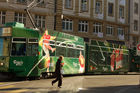 Carlsberg euro 08 Tram in Basel. Sponsoring, Werbung, UEFA, Fussball. Spiel. Sport. 
Switzerland, Basel, euro 08 football championsship Carlsberg sponsoring a green 
Euro 08 tram