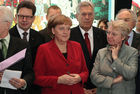 Der Besuch am diesjährigen Capgemini-Stand: Antonio Schnieder (Group Executive Board Member, Capgemini); Bundeskanzlerin Angela Merkel (CDU); Michael Glos (Bundesminister für Wirtschaft und Technologie, CSU); Annette Schavan (Bundesministerin für Bildung und Forschung, CDU). (C)Fotodienst/Markus Mirsche