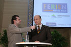  Die Ferien-Messe Wien, Messe für Urlaub, Reisen und Freizeit sowie die Vienna Autoshow wurden heute im Messezentrum feierlich eröffnet. Bild: Peter Agathakis (ORF, Moderation) und Heinz Slesak (GF Vertrieb und Marketing Porsche Austria GmbH & Co). Foto: Anna Rauchenberger, am 12.01.2006