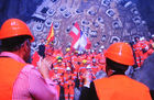 Dem abtretenden Bundesrat und UVEK-Vorsteher Moritz Leuenberger kommen fast die Tränen beim Durchstich im Weltrekordhalter Gotthard Tunnel. Touched and close to get wet eyes: Swiss Chancellor Moritz Leuenberger live from the Gotthard break through