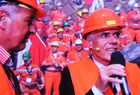 Freude herscht: Adolf Ogi und Bundesrat Moritz Leuenberger sind gerührt, fallen sich in die Arme und kriegen feuchte Augen beim Gotthard-Tunnel-Durchstich. Huging Adolf Ogi and swiss chancellor Moritz Leuenberger at the break through in the worlds longest tunnel the Gotthard (57 km)