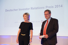 Foto: Moderatorin; Kay Bommer - Geschäftsführer Deutscher Investor Relations Verband e.V.