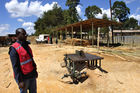 One of 10 Kenya Red Cross timber sites for reconstruction Kenyan farmhouses. Eine von zehn Rot-Kreuz-Holzwerkstätten für den Wiederaufbau der Bauernhütten von vertriebenen Flüchtlingen.