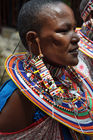 Beautifull Masai Women with tradition colour glass perls around her neck. Hübsche Masai-Frau mit traditionellem Glasperlenschmuck