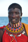 Masai Men with traditional neckrings. Junger Masai-Mann mit traditionellem Glasperlenschmuck um den Nacken