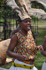 A young Masai women is dancing for the VIP-Welcome ceremony at Diani Reef. Masai-Frau tanzt zur traditionellen Musik und Folklore im Diani Reef zum VIP-Empfang