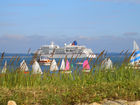 MS Europa am Trimmenburger Strand mit den Windsurfern. Cruise Ship MS Europe at the trimmenburger beach with the windsurfers 