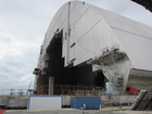 Die neue Schützhülle, der New Safe Confinement, befindet sich kurz vor seiner Fertigstellung. Begonnen mit dem Bau wurde Ende 2010. Zuvor wurden als Vorbereitung umfangreiche Arbeiten am Reaktorgebäude durchgeführt. Derzeit beträgt das Gewicht 36.000 Tonnen. Am Ende des Projekts sollen es 40.000 Tonnen sein. Die Kosten für das Mammutprojekt belaufen sich auf rund 1,5 Mrd. Euro.